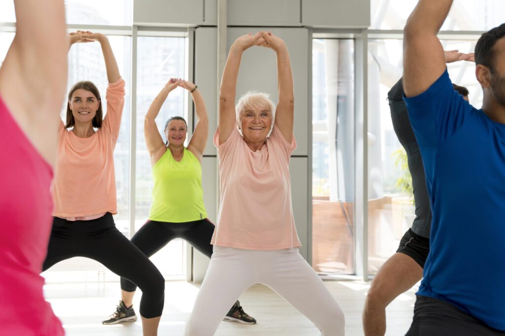 active people taking part zumba class scaled.jpg